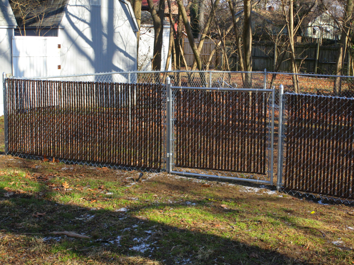 215_galvanized-chainlink-with-brown-privacy-slats Chainlink - Forrest Fencing