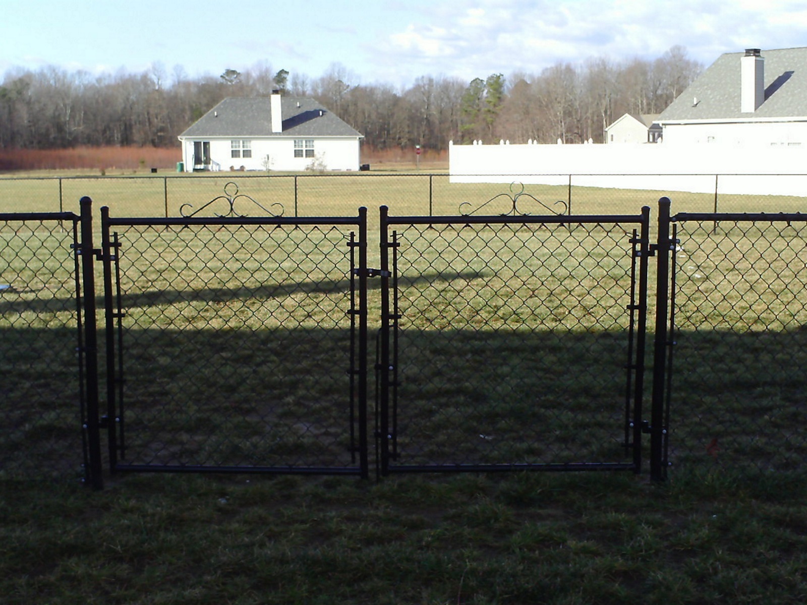 45_black-vinyl-coated-chainlink-double-gate-with-scrolljpg Chainlink - Forrest Fencing