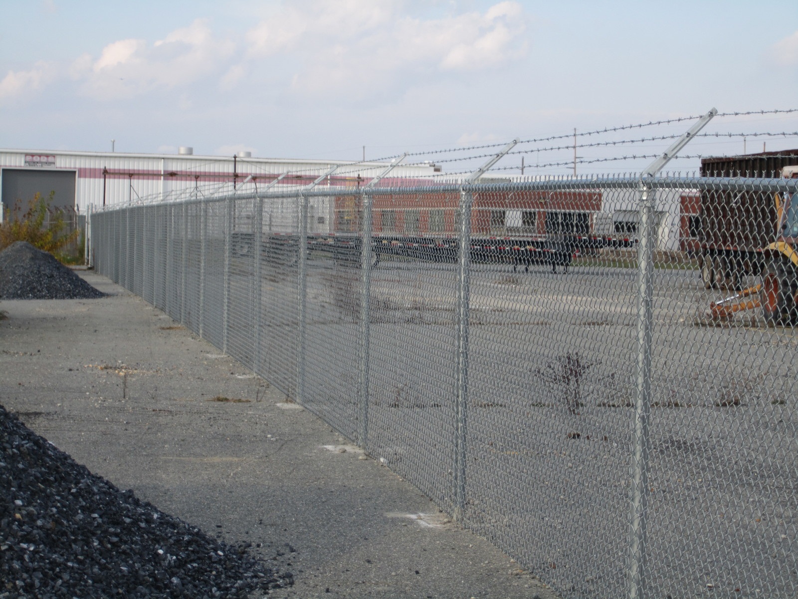 48_galvanized-chainlink-with-barb-wire-topjpg Chainlink - Forrest Fencing